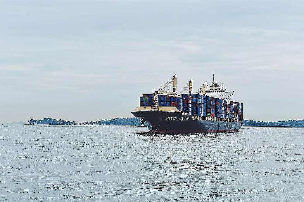 Cargo ship on the ocean carrying freight
